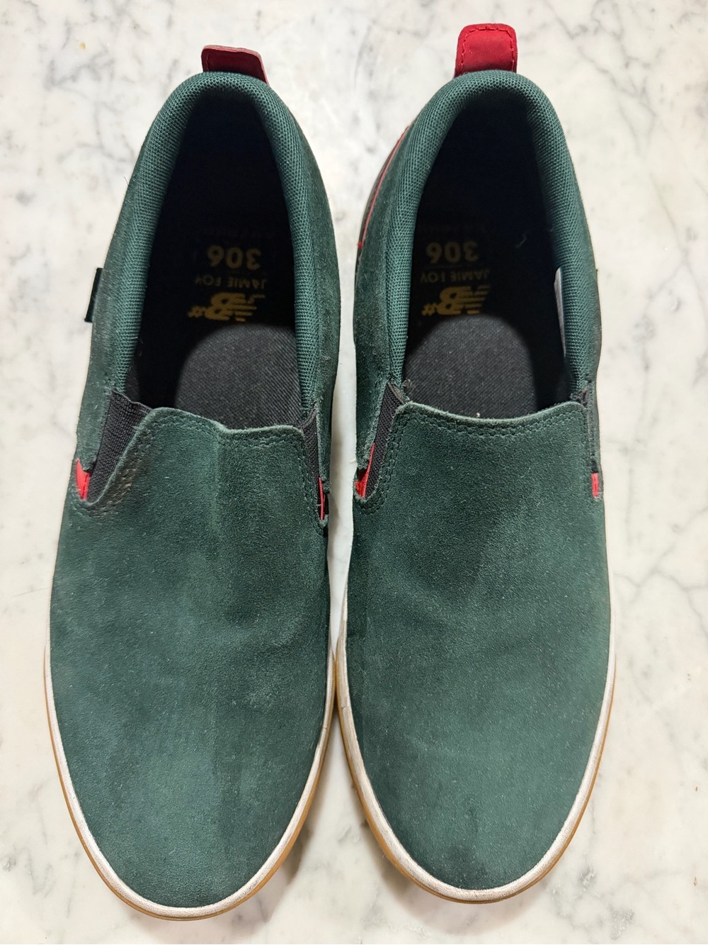 New Balance Men’s Forest Green Slip-On Suede Loafers with Red Accents